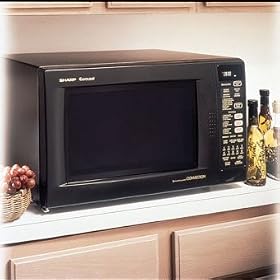 Sharp R930AK 1.5 Cu. Ft. Countertop Microwave Oven with 900 Cooking Watts and 4-Way... by Sharp