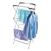 clothes horse with towels and shirts