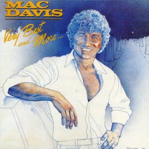 Mac Davis - One Hell Of A Woman (1974)-int010 Lyrics - Zortam Music