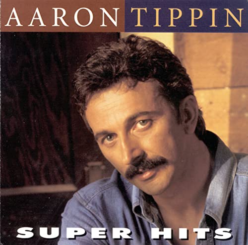 Aaron Tippin - She Made a Memory Out of Me Lyrics - Zortam Music