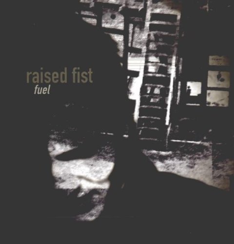 Raised Fist - Tribute Lyrics - Zortam Music